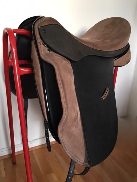 Ideal Suzannah with smooth, black Buffaloe skirt & flaps, beige Nubuck seat & pads and patent rolls & piping.